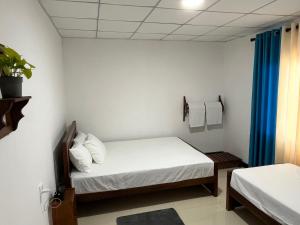 Ένα ή περισσότερα κρεβάτια σε δωμάτιο στο Tea Heaven Retreat