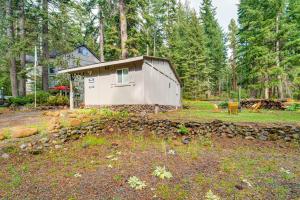 a small shack in the middle of a yard at Gateway to Crater Lake Cabin in Klamath Falls! in Rocky Point