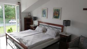 Postel nebo postele na pokoji v ubytování Villa Toscana