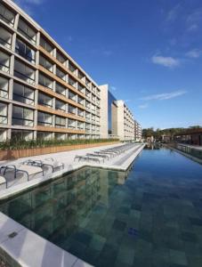 Bazén v ubytování Lofts 415 e 417 Completos em Livin Home Resort ao lado do Ramblas nebo v jeho okolí