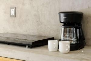 Facilități de preparat ceai și cafea la Spectacular Suite Steps Away From Center La Punta