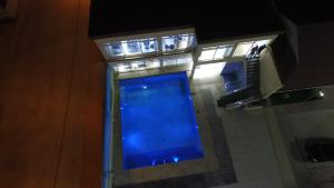 Bazén v ubytování Indico Apart Hotel nebo v jeho okolí