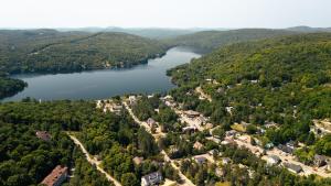 an aerial view of a town and a lake at Private luxury Room -B, King bed, Full Ensuite, Free Shuttle to ski hill and Resort in Mont-Tremblant