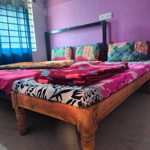 Postel nebo postele na pokoji v ubytování Coorg veena villa