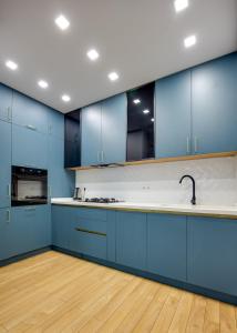 Η κουζίνα ή μικρή κουζίνα στο Hilton ApartHotel