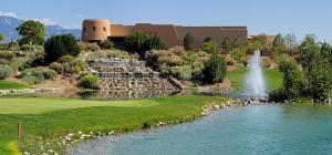 a resort with a fountain and a pond and a water park at Steps From Balloon Fiesta Park Outdoor Retreat in Albuquerque