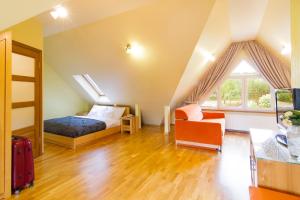Posteľ alebo postele v izbe v ubytovaní Hotel Pory Roku
