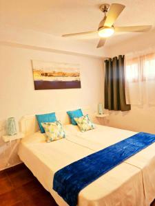 Ένα ή περισσότερα κρεβάτια σε δωμάτιο στο Comfortable centrally located apartment