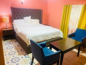 Ένα ή περισσότερα κρεβάτια σε δωμάτιο στο elevation lodge imatt