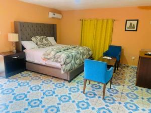 Ένα ή περισσότερα κρεβάτια σε δωμάτιο στο elevation lodge imatt