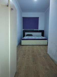 En eller flere senge i et værelse på Masazır Hostel