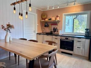 Kuchyň nebo kuchyňský kout v ubytování Aurora Boutique Hut with private sauna