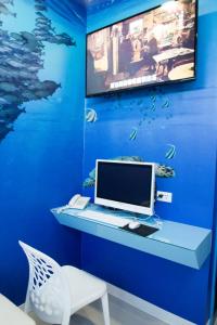 TV a/nebo společenská místnost v ubytování Morwing Hotel - Ocean