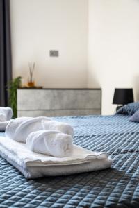 Ένα ή περισσότερα κρεβάτια σε δωμάτιο στο Luani's Apartments