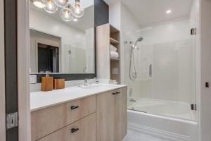 a bathroom with a sink and a shower and a tub at Socal Style in Encinitas +59 photos