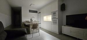 TV a/nebo společenská místnost v ubytování Penismar Paradis