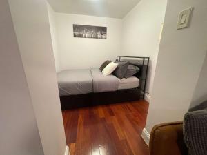 a small bedroom with a bed in a room at Private Studio Apartment in Union Square in New York +7 photos