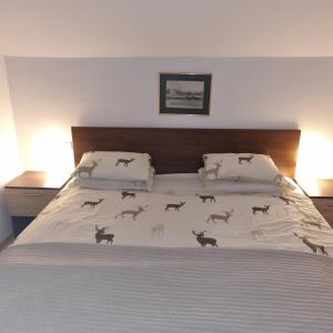 Cama o camas de una habitación en Rupicapra Holiday Mountain House