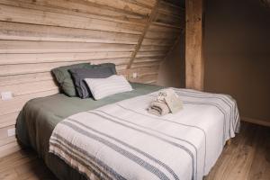 Postel nebo postele na pokoji v ubytování La maison de July