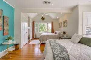 a bedroom with two beds and a window at Walk to Hudson River Waterfront Newburgh Home in Newburgh