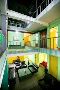 Uma área de estar em Hotel Nana