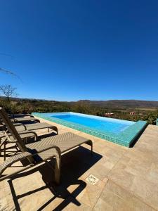 Πισίνα στο ή κοντά στο Casa de Maitreya - piscina, ar condicionado