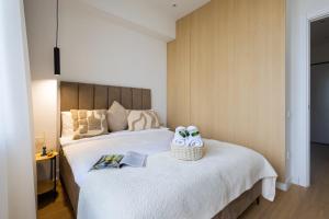 Ένα ή περισσότερα κρεβάτια σε δωμάτιο στο hotelise l Pastel Apartment