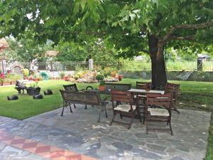 A garden outside Asteras Hotel