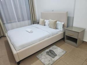Ένα ή περισσότερα κρεβάτια σε δωμάτιο στο Modern 2 Bed All Ensuite Near Nakuru CBD
