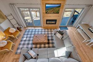 an overhead view of a living room with a couch and a fireplace at Calling Me Home in Blowing Rock