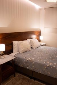 Ένα ή περισσότερα κρεβάτια σε δωμάτιο στο Mistiq Cabo Condominium with Style and Comfort +53 φωτογραφίες