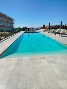 Πισίνα στο ή κοντά στο Mistiq Cabo Condominium with Style and Comfort