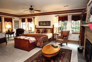a bedroom with a bed and a living room at Deer Creek Winery at Watson Estate in Uniontown +134 photos