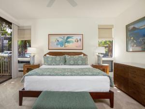 Ένα ή περισσότερα κρεβάτια σε δωμάτιο στο Wailea Grand Champions 71
