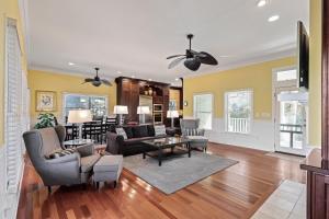 a living room with a couch and a table at AB15: 15 Atlantic Beach in Kiawah Island