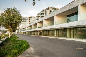 an empty street in front of a building at Porto de Gaia in Vila Nova de Gaia