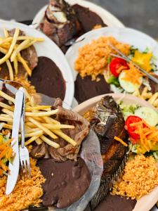 a bunch of plates of food on a table at Hospedaje chachalacas in Chachalacas