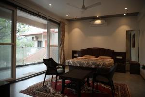 Posezení v ubytování Gulmohar Resort and Spa