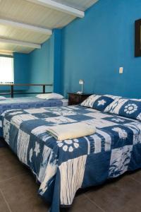 Postel nebo postele na pokoji v ubytování Hostal Casa del Sol Apartamento