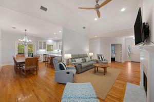 a living room with a couch and a table at SI2638: 2638 Seabrook Island Road in Seabrook Island
