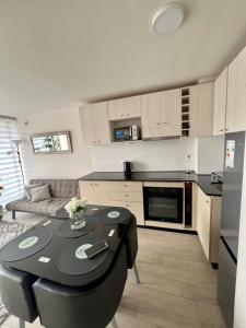 Η κουζίνα ή μικρή κουζίνα στο Departamento nuevo moderno y elegante