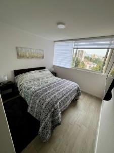 Ένα ή περισσότερα κρεβάτια σε δωμάτιο στο Departamento nuevo moderno y elegante +9 φωτογραφίες