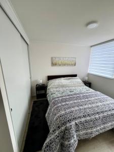 Ένα ή περισσότερα κρεβάτια σε δωμάτιο στο Departamento nuevo moderno y elegante