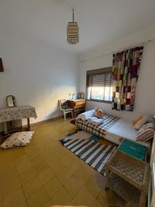 Ένα ή περισσότερα κρεβάτια σε δωμάτιο στο Studio coeur tanger