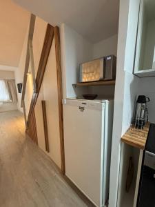 Køkken eller tekøkken på Departamento en el centro de Valeria del Mar