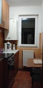 Nhà bếp/bếp nhỏ tại 3 bed apartment Iasi 5 min from aeroport