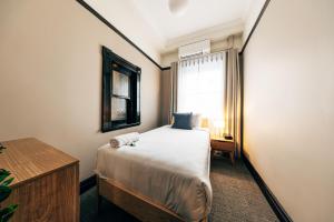 Ένα ή περισσότερα κρεβάτια σε δωμάτιο στο Strathfield Hotel +54 φωτογραφίες