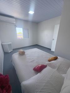 Postel nebo postele na pokoji v ubytování Hostel Banzeiro