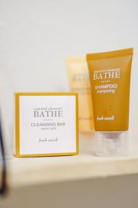 two products sitting on a shelf next to a box at Serenity Rincon Guesthouse in Rincon