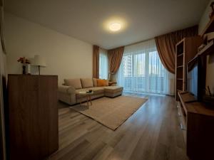 TV a/nebo společenská místnost v ubytování Ella Apartament Avantgarden-Free private parking